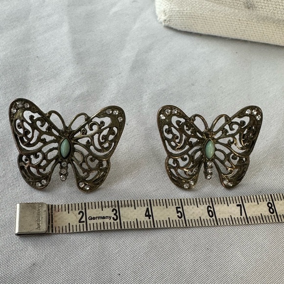 Open scrollwork butterfly and rhinestone earrings - Picture 4 of 5